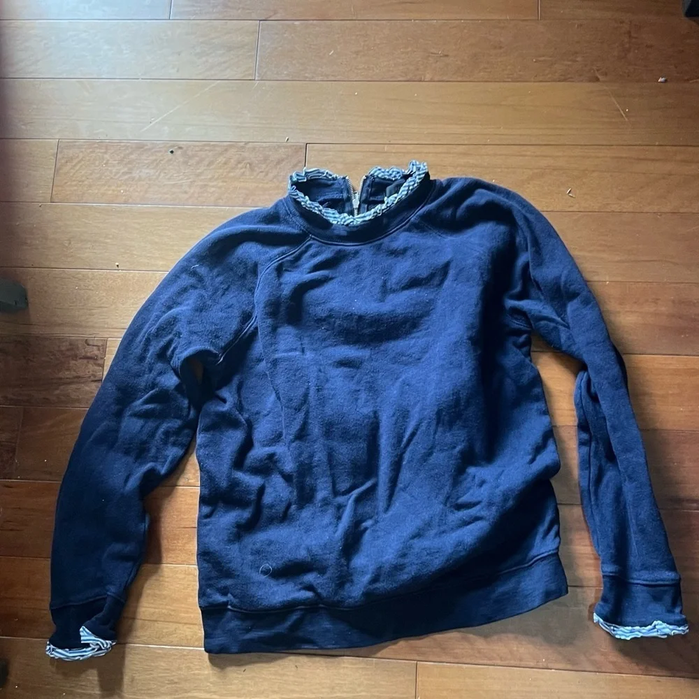 J.Crew dark blue women’s small sweater with blue & white ruffle trim.